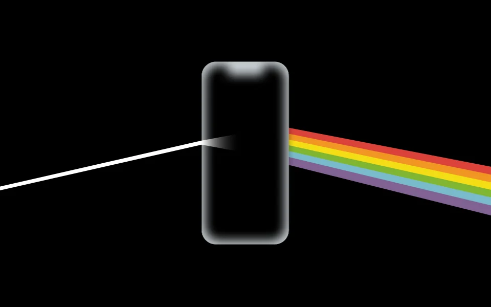 A beam of light passes through a phone and comes out as a rainbow.